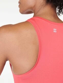 Sweaty Betty Athlete Crop Seamless Gym Vest - Coral Pink -Outlet Elevate Activewear Store sweaty betty athlete crop seamless gym vest coral pink sb6545c 3