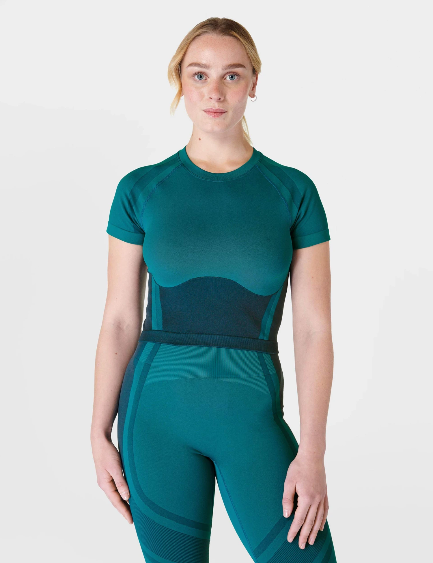 Sweaty Betty Silhouette Sculpt Seamless Short Sleeve Top - Reef Teal Blue/Navy Blue 1 Sweaty Betty Silhouette Sculpt Seamless Short Sleeve Top - Reef Teal Blue/Navy Blue