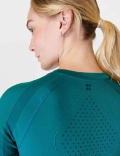 Sweaty Betty Silhouette Sculpt Seamless Short Sleeve Top - Reef Teal Blue/Navy Blue 9 Sweaty Betty Silhouette Sculpt Seamless Short Sleeve Top - Reef Teal Blue/Navy Blue -Outlet Elevate Activewear Store sweaty betty silhouette sculpt seamless short sleeve top reef teal blue navy blue sb9063 4